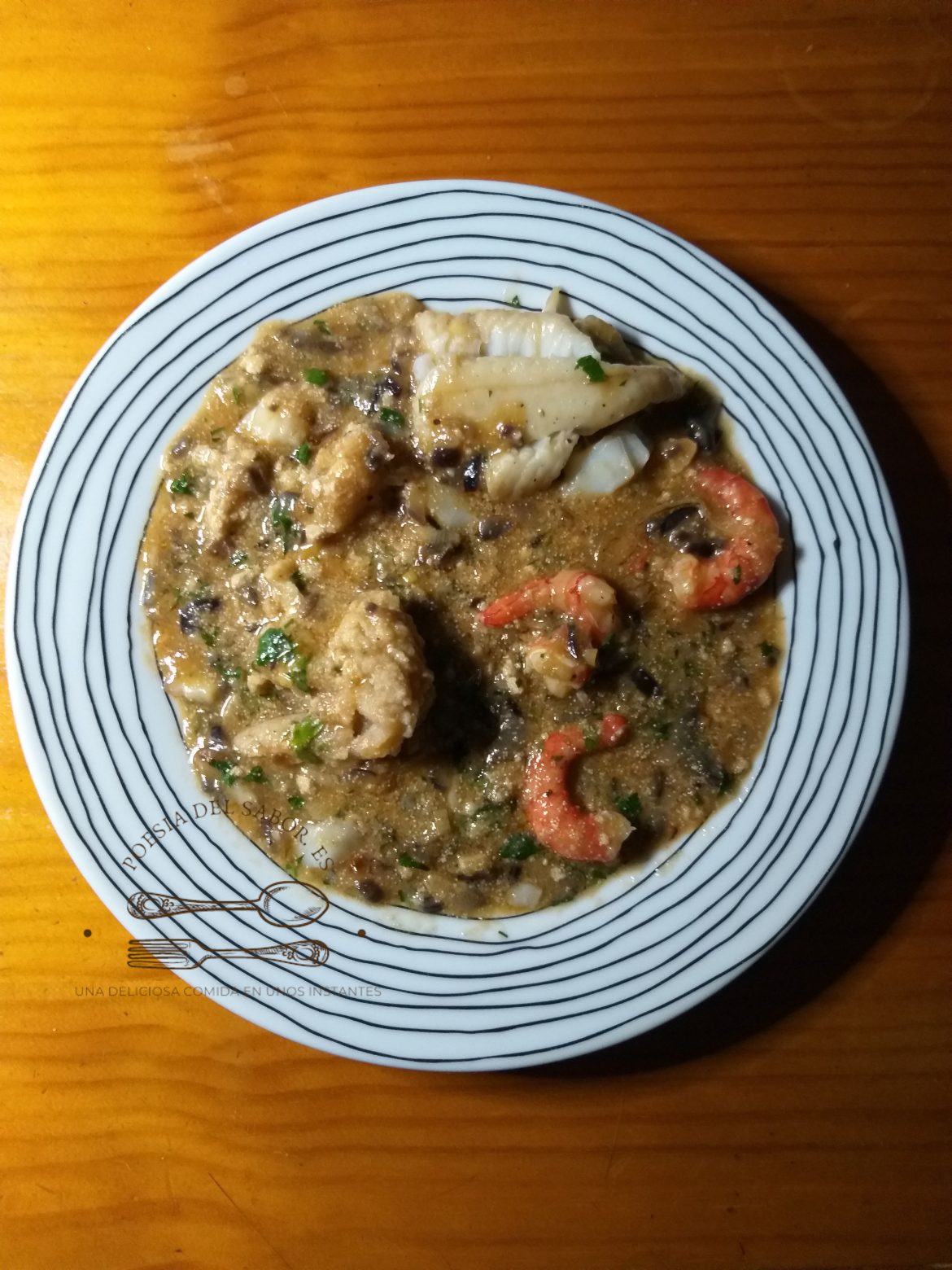 Gallo en salsa de carabineros